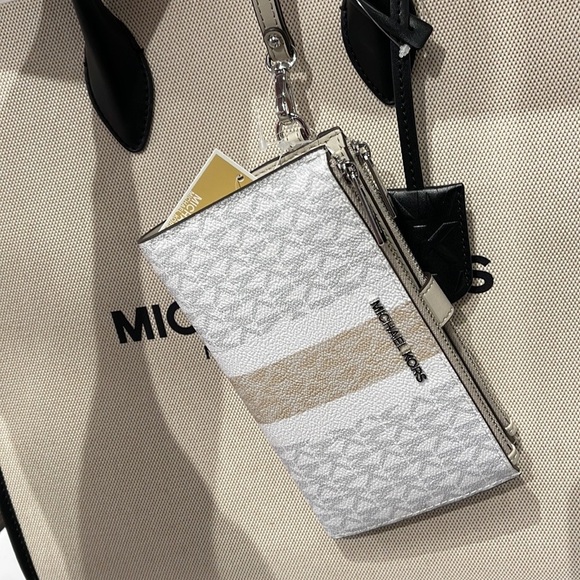 Michael Kors Handbags - MICHAEL KORS LARGE DOUBLE ZIP WRISTLET 
Light Sand Multi